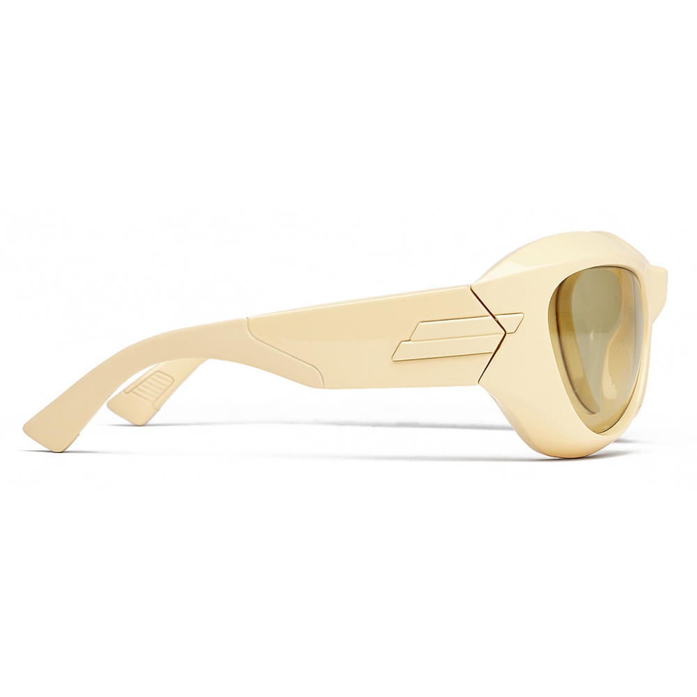 Bottega Veneta® Cangi Wraparound Injected Acetate Sunglasses in Yellow /  Bronze. Shop online now.