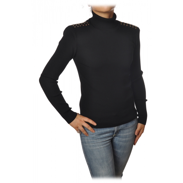 black sweater with gold buttons on sleeves