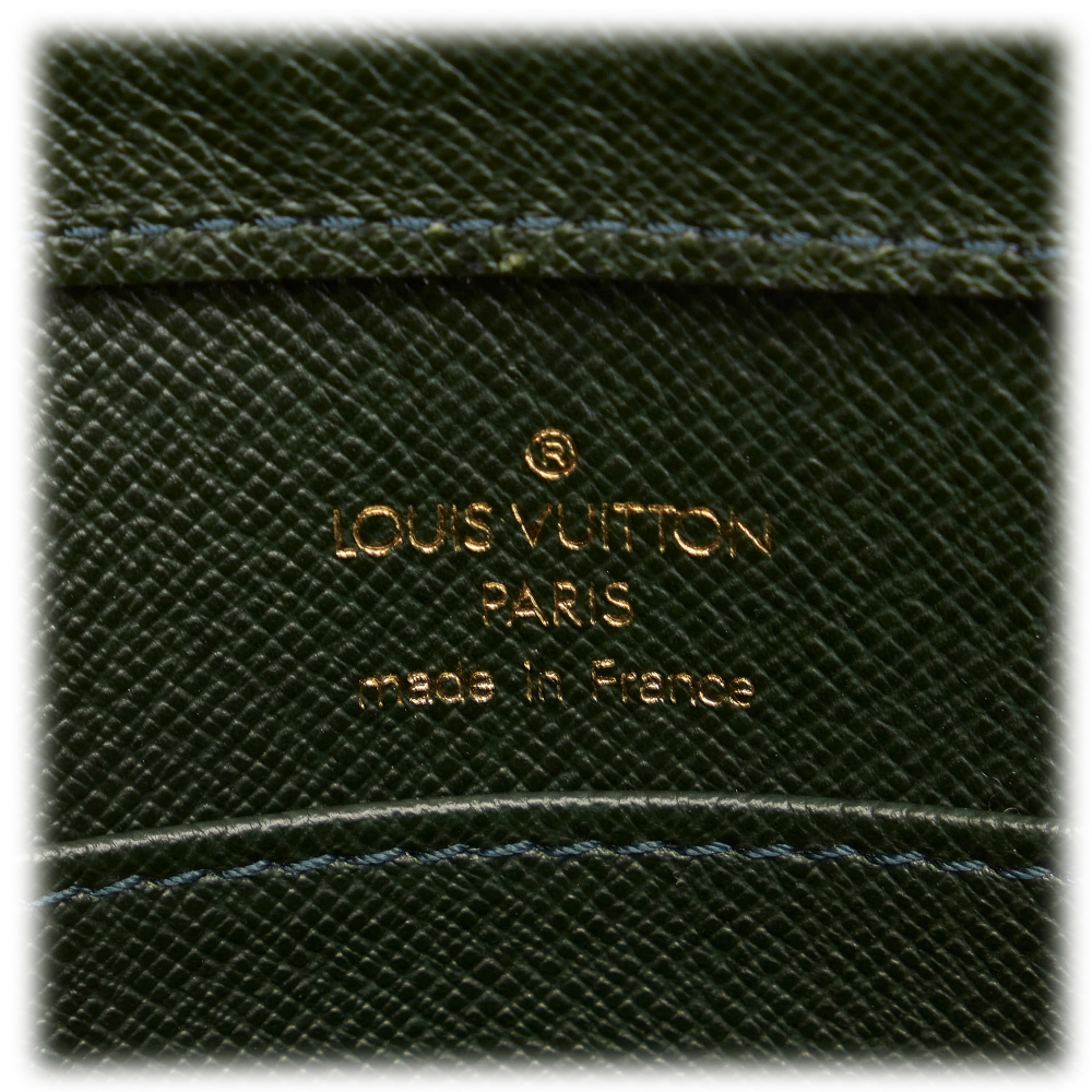 Sell Louis Vuitton Taiga Baikal Clutch - Dark Brown