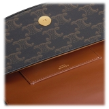 Céline - Clutch on Strap Tabou in Triomphe Canvas and Calfskin - Tan - Bag - Céline Exclusive Collection