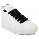 Dolce & Gabbana - White, Black and Gold Calf Leather Portofino Low Top Sneakers - Dolce & Gabbana Exclusive Luxury Collection