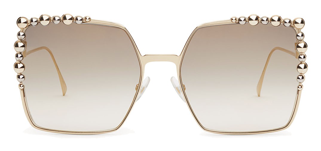 lenshop on X: Oversize cat-eye F is Fendi sunglasses, made of gold-colour  metal. The model has a sophisticated and feminine design, accentuated by  black acetate edges. The narrow temples are decorated with