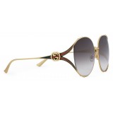 Gucci - Occhiali da Sole Rotondi in Metallo - Oro con Dettaglio Forcella e Dettaglio Web in Smalto - Gucci Eyewear