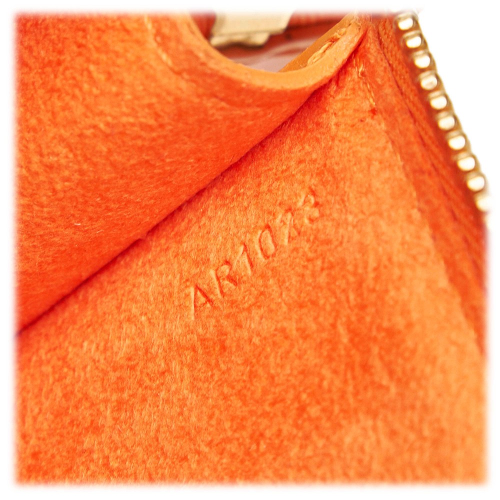 Louis Vuitton Orange Epi Honfleur Clutch Price: - Depop