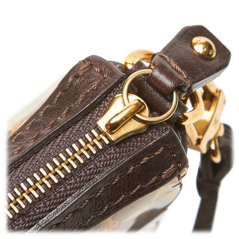 Pochette accessoire leather handbag Louis Vuitton Brown in Leather -  26877792