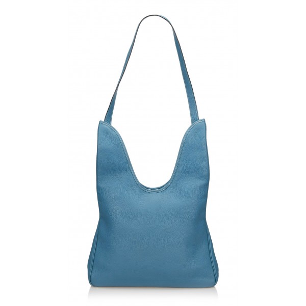 blue leather handbags and purses