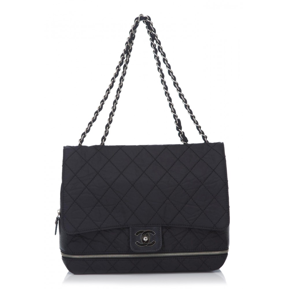 1980's CHANEL oval black leather 'CC' bag with gilt chain at 1stDibs