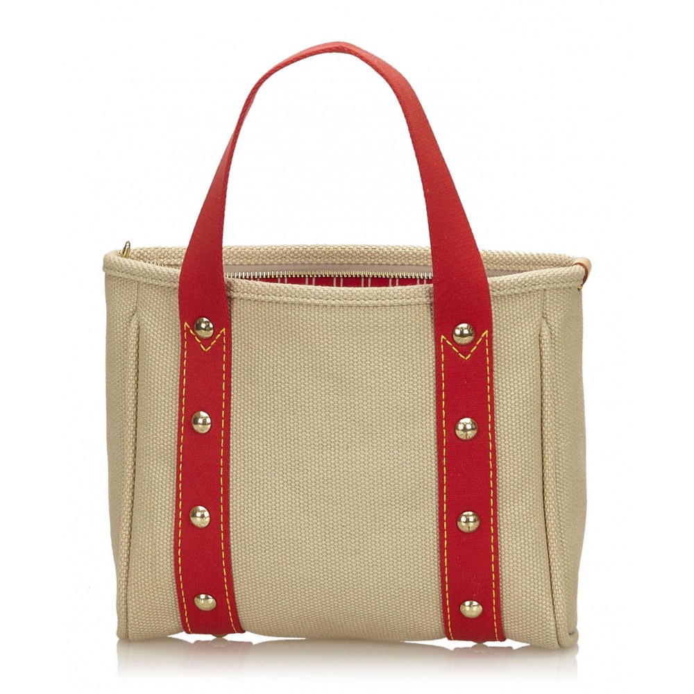 Antigua cloth mini bag Louis Vuitton Beige in Cloth - 21081199