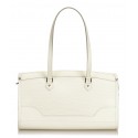 A Louis Vuitton White Epi Leather Bagatelle PM Bag. - Bukowskis