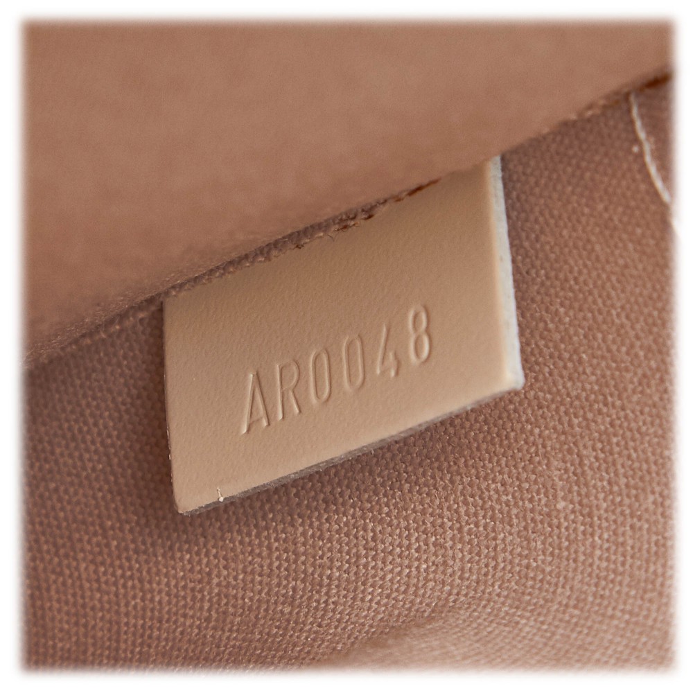 Madeleine leather handbag Louis Vuitton White in Leather - 36607733