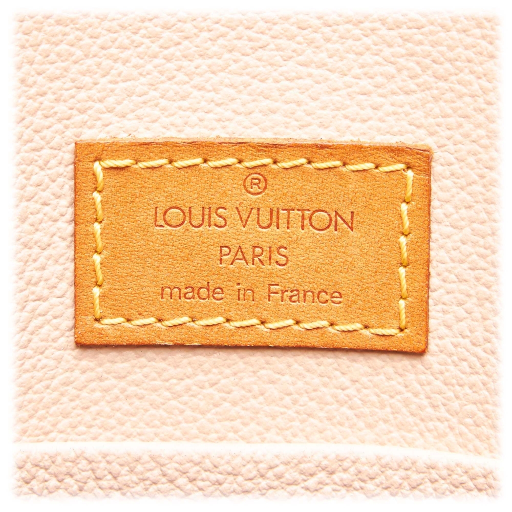 LOUIS VUITTON Vintage Monogram Sac Plat Handbag - A Retro Tale