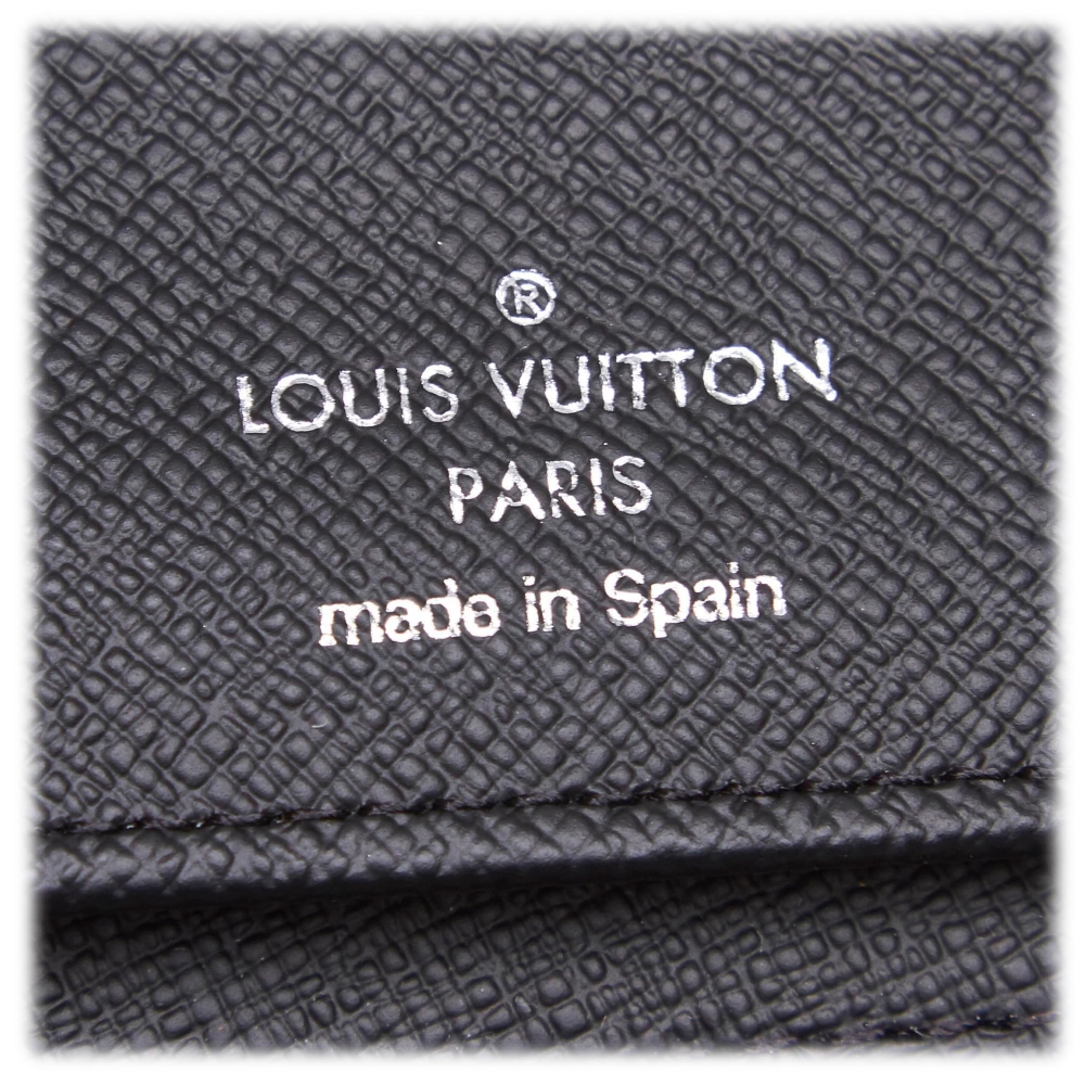 Authenticated Used LOUIS VUITTON Damier Graffiti Zippy Wallet Vertical  N63095