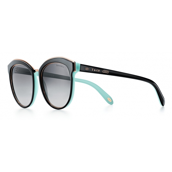 tiffany glasses with key on side