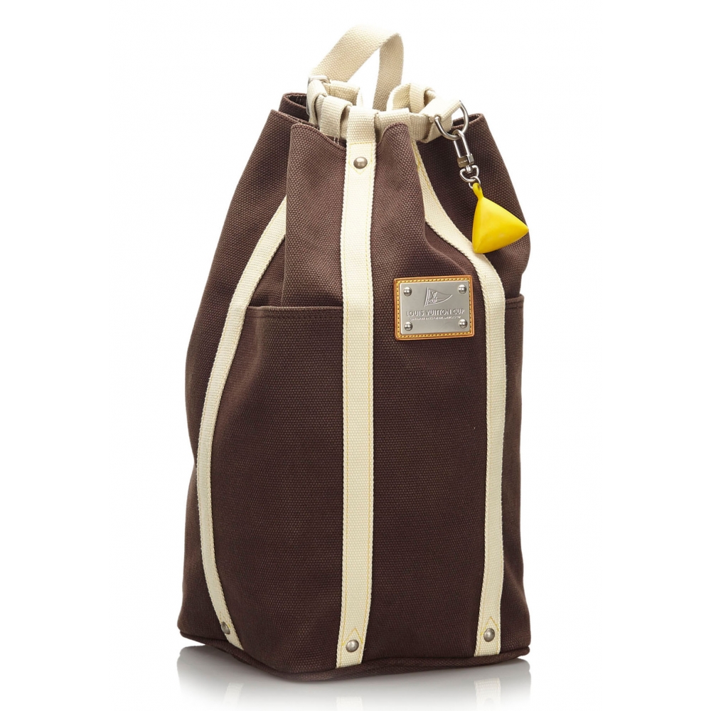 Antigua handbag Louis Vuitton Brown in Cotton - 38322099