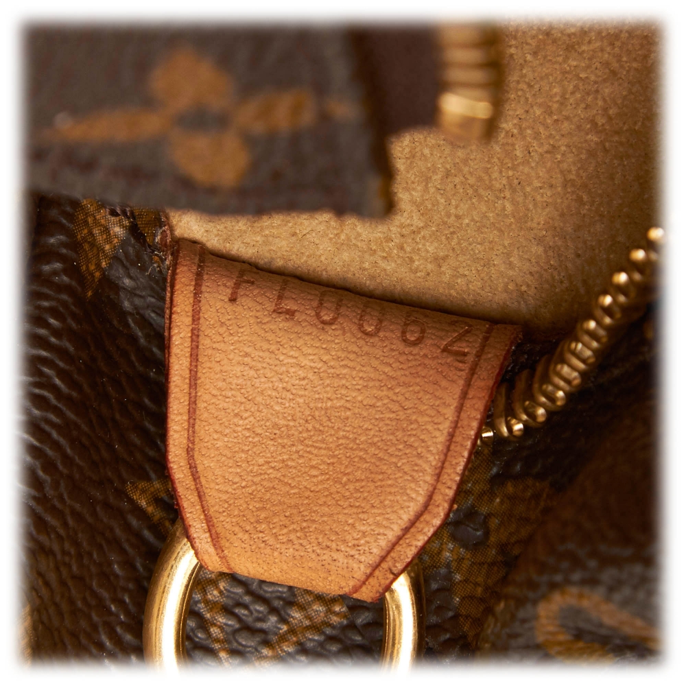 Louis Vuitton Luco Leather Handbag