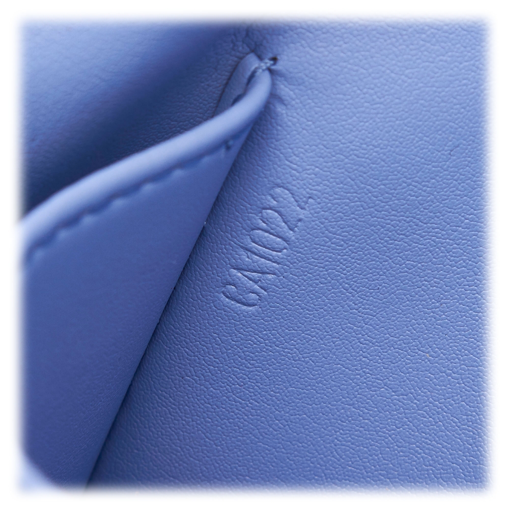 Louis Vuitton 1997 Vintage Blue Vernis Bags PRINT AD Advertisement