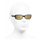 chanel sunglasses gold logo